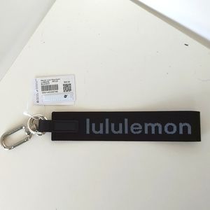 Lululemon never lost keychain, black and white
